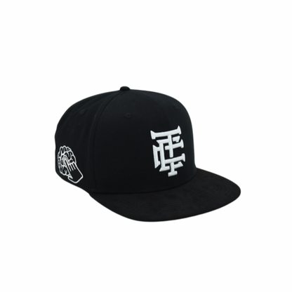 SnapBack noire avec visière en Suède + spécial box